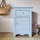 Handcrafted blue chest of drawers.