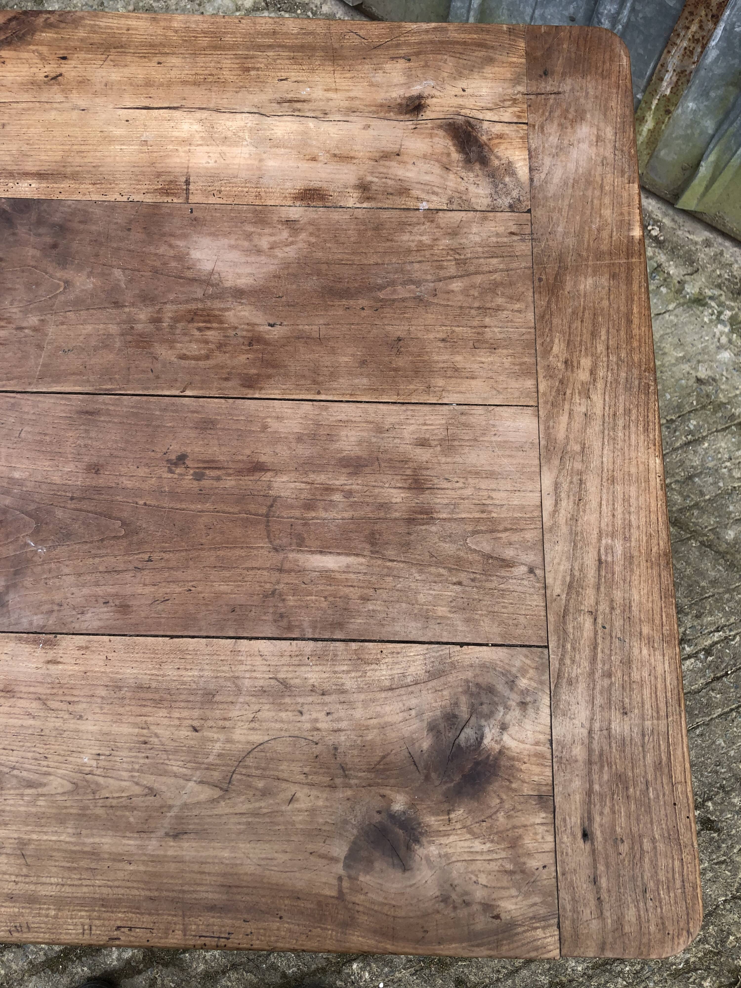 Antique cherry farmhouse table with 2 drawers and 1 pull-out