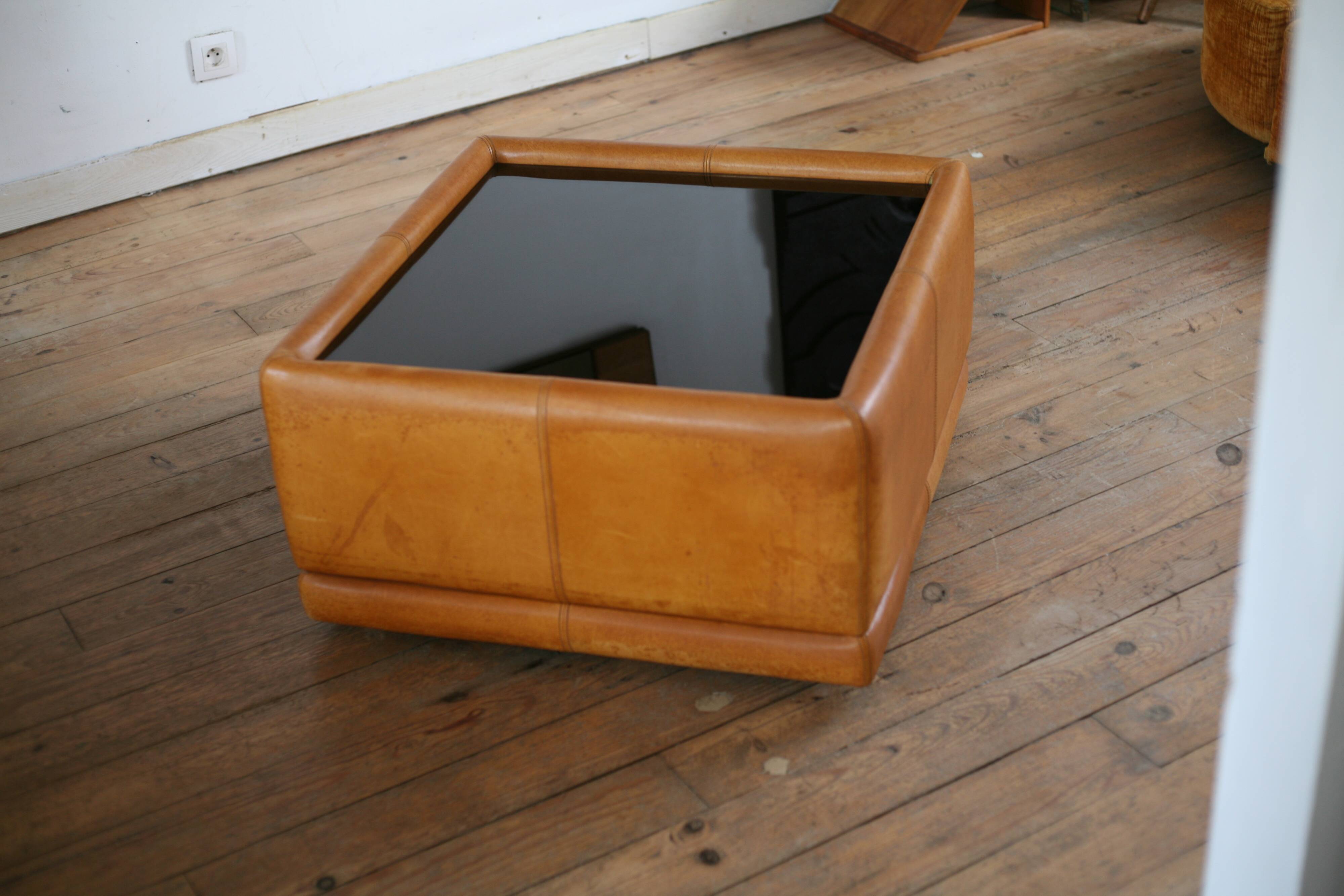 black leather and glass coffee table, vintage design