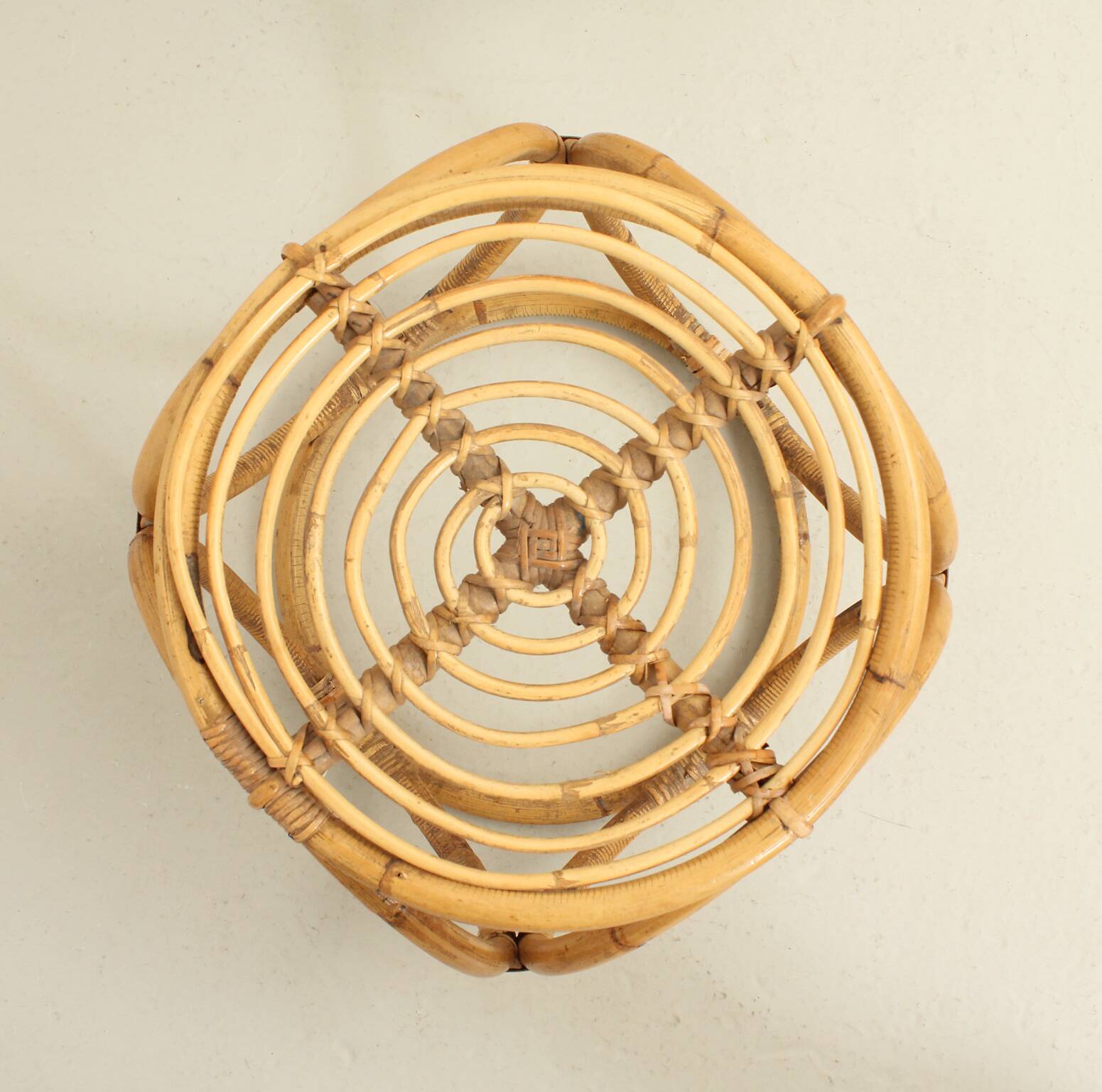 Set of three 1970s rattan stools, Spain.