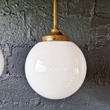 Pair of Art Deco pendant lights in brass and white opaline, 1920-30