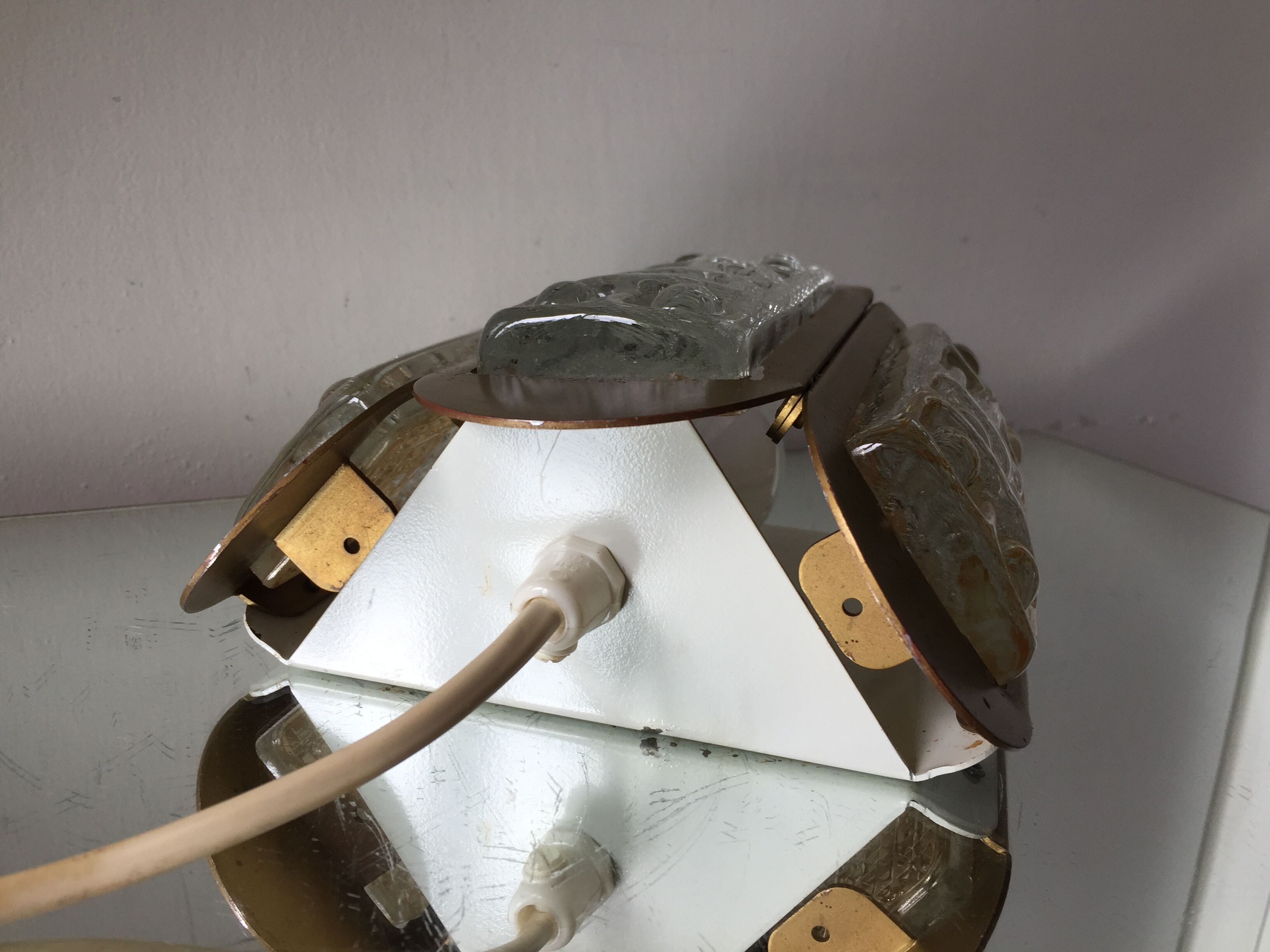 Scandinavian midcentury wall light in crystal and mat gold colored metal