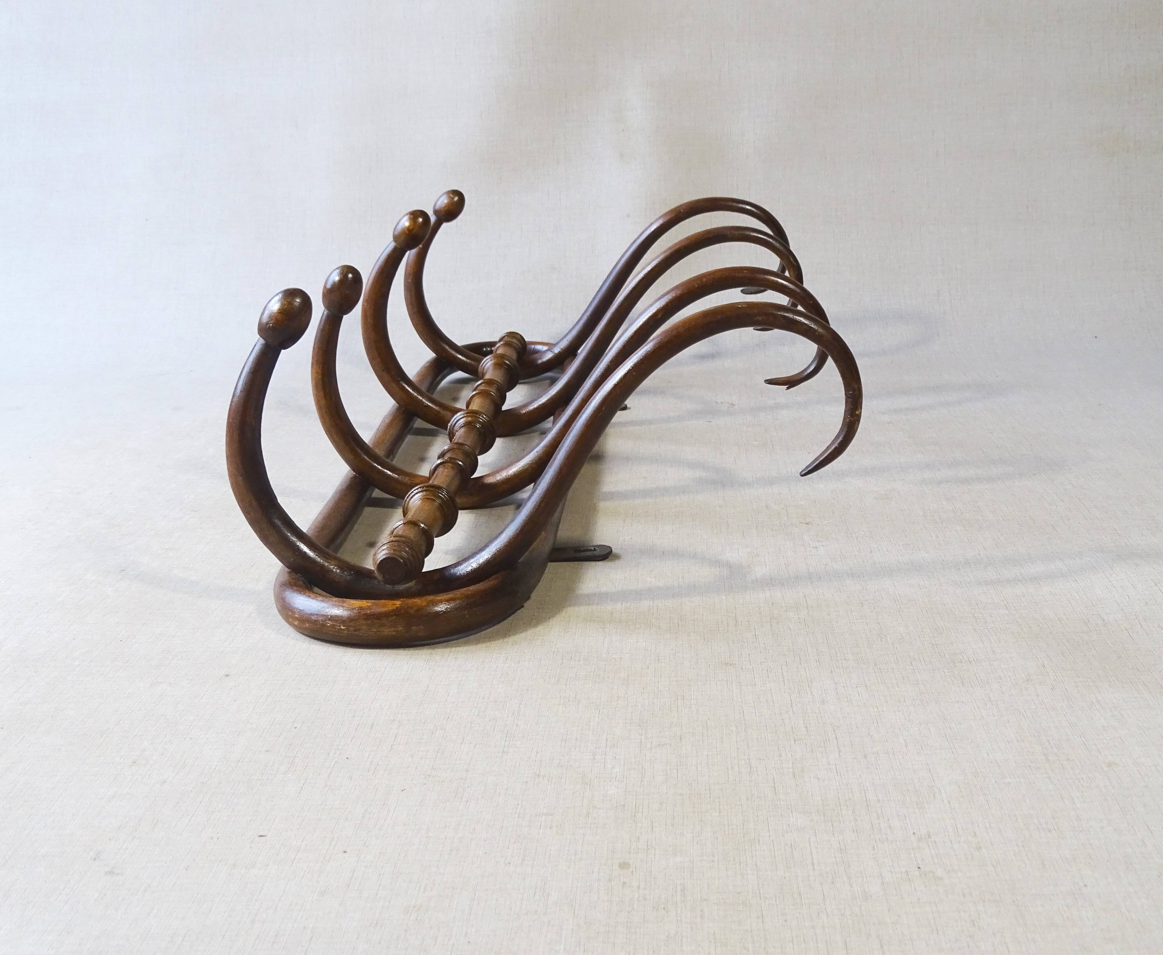 Wall coat rack by Kohn, bent wood 1910, no Thonet.