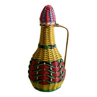 Glass bottle covered with multicolored scoubidou