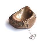 Bronze empty pocket by Monique Gerber, 1970s