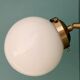 Applique globe vintage en opaline blanche