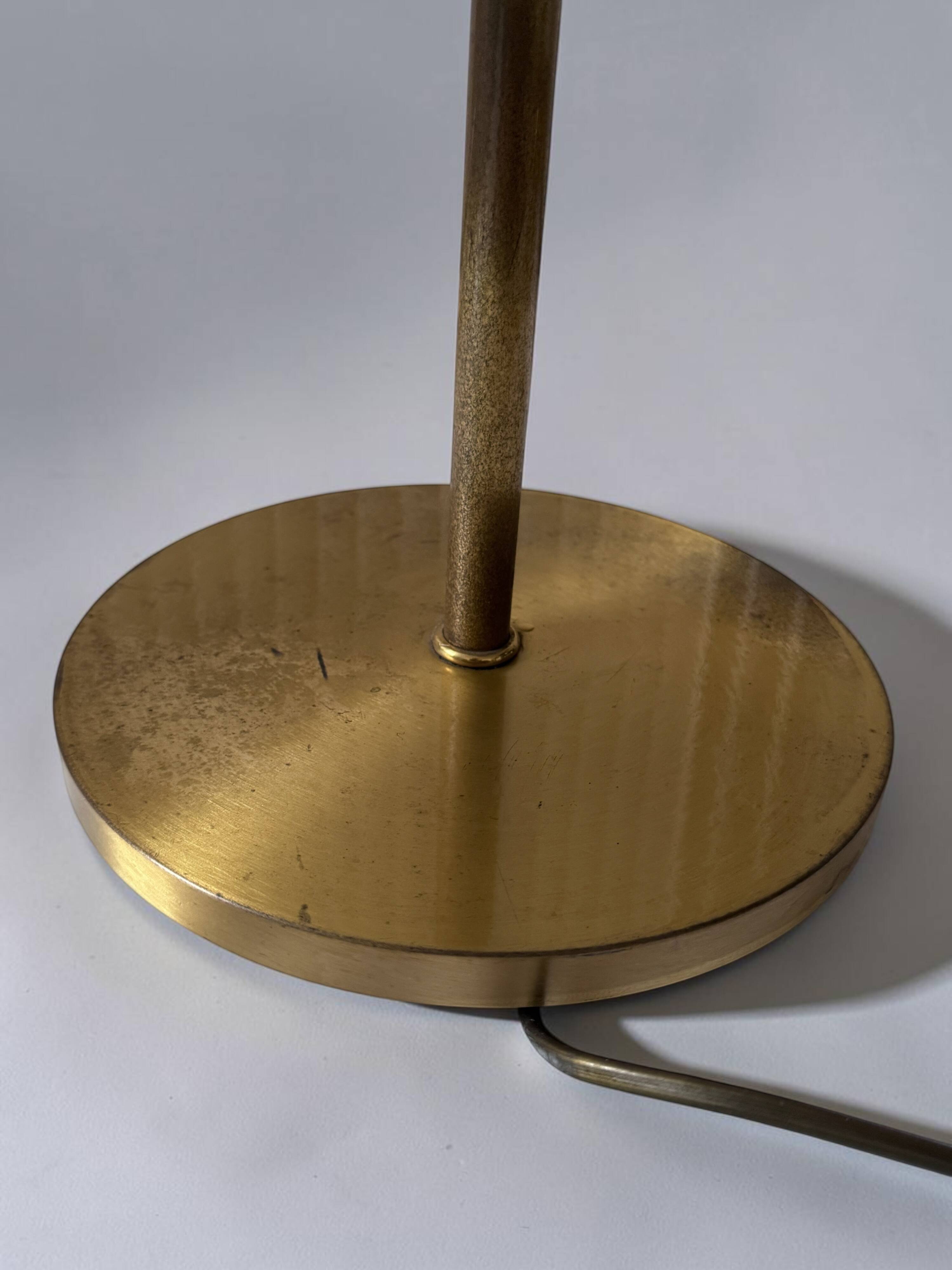 Brass reading floor lamp, adjustable arm, vintage anthracite shade.