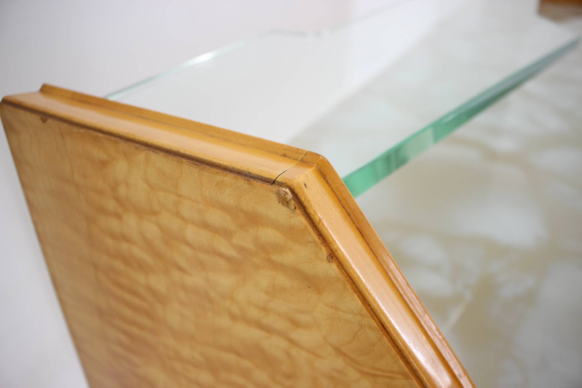 1960s italian sideboard/chest of drawers in high gloss finish with glass top and shelf