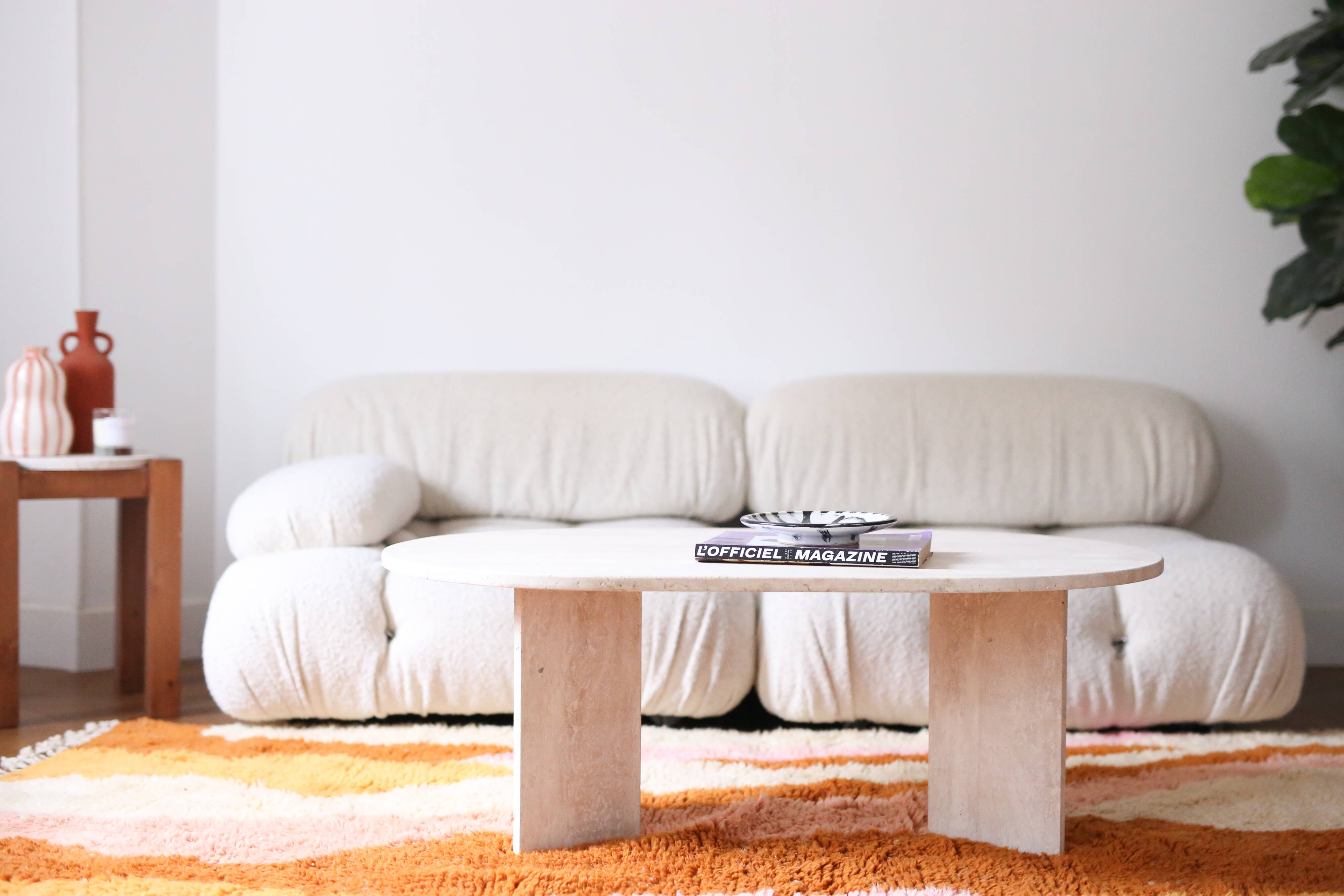 Oval travertine coffee table