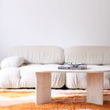 Oval travertine coffee table