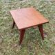 Coffee table of the 50s in blond mahogany inlaid compass feet