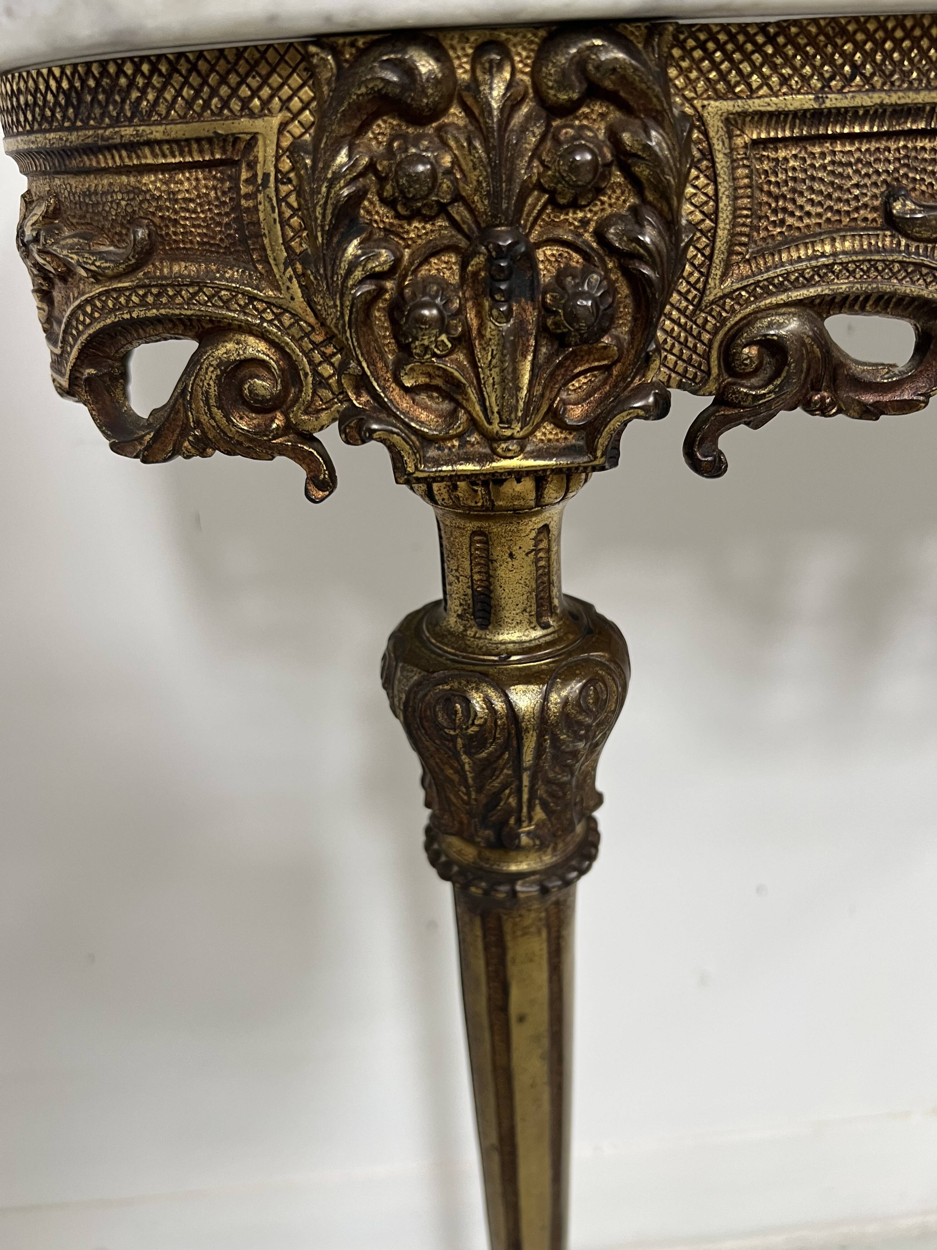 Louis XVI style console in gilded bronze, 20th century