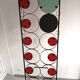 Coat racks, hats and umbrellas wall-mounted in wrought iron.