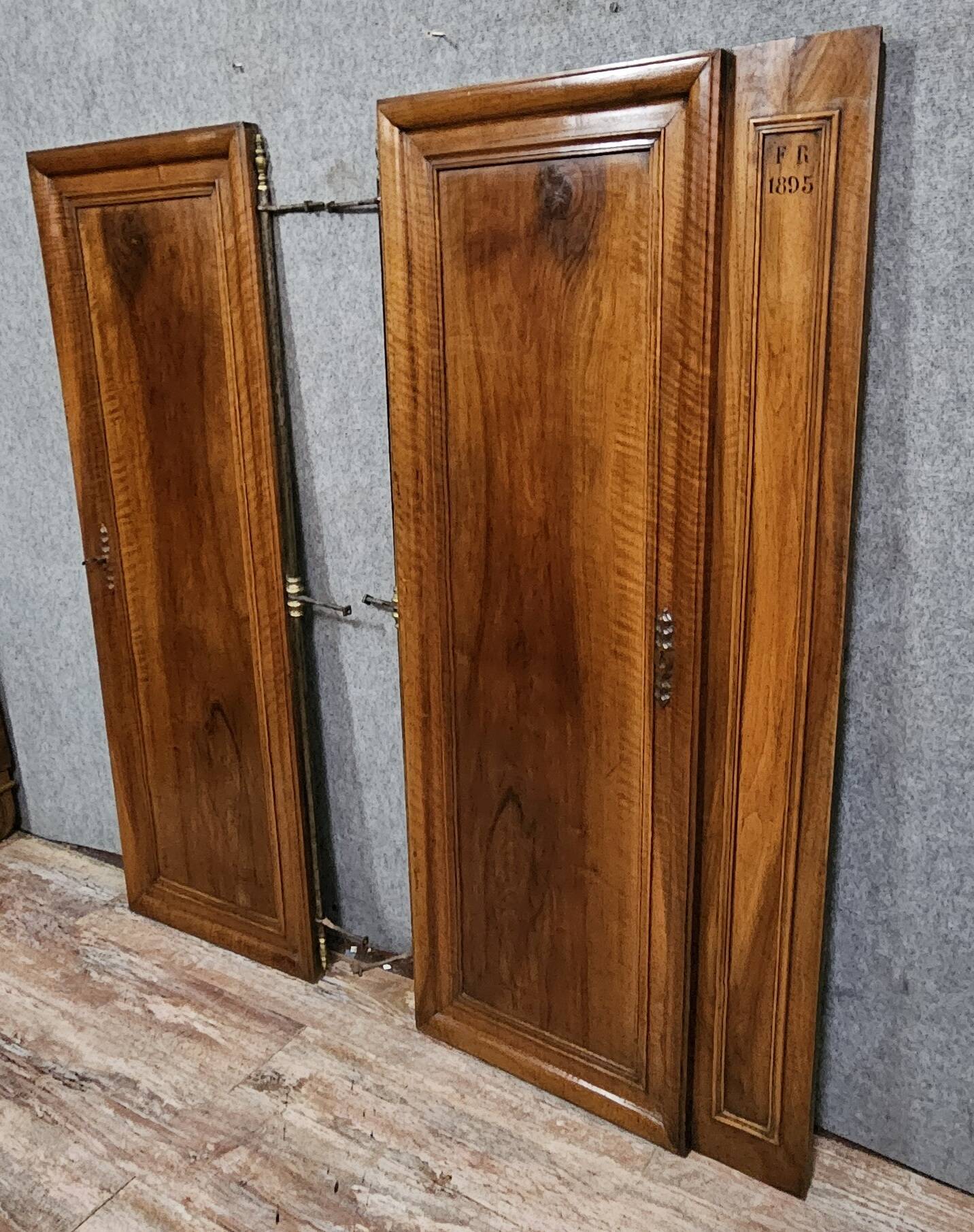 Pair of walnut wardrobe doors, dated 1895 / for cupboard