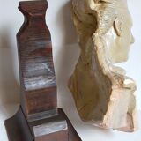 Bust of a woman "the elegant"XIXth in painted plaster signed on its solid wood base