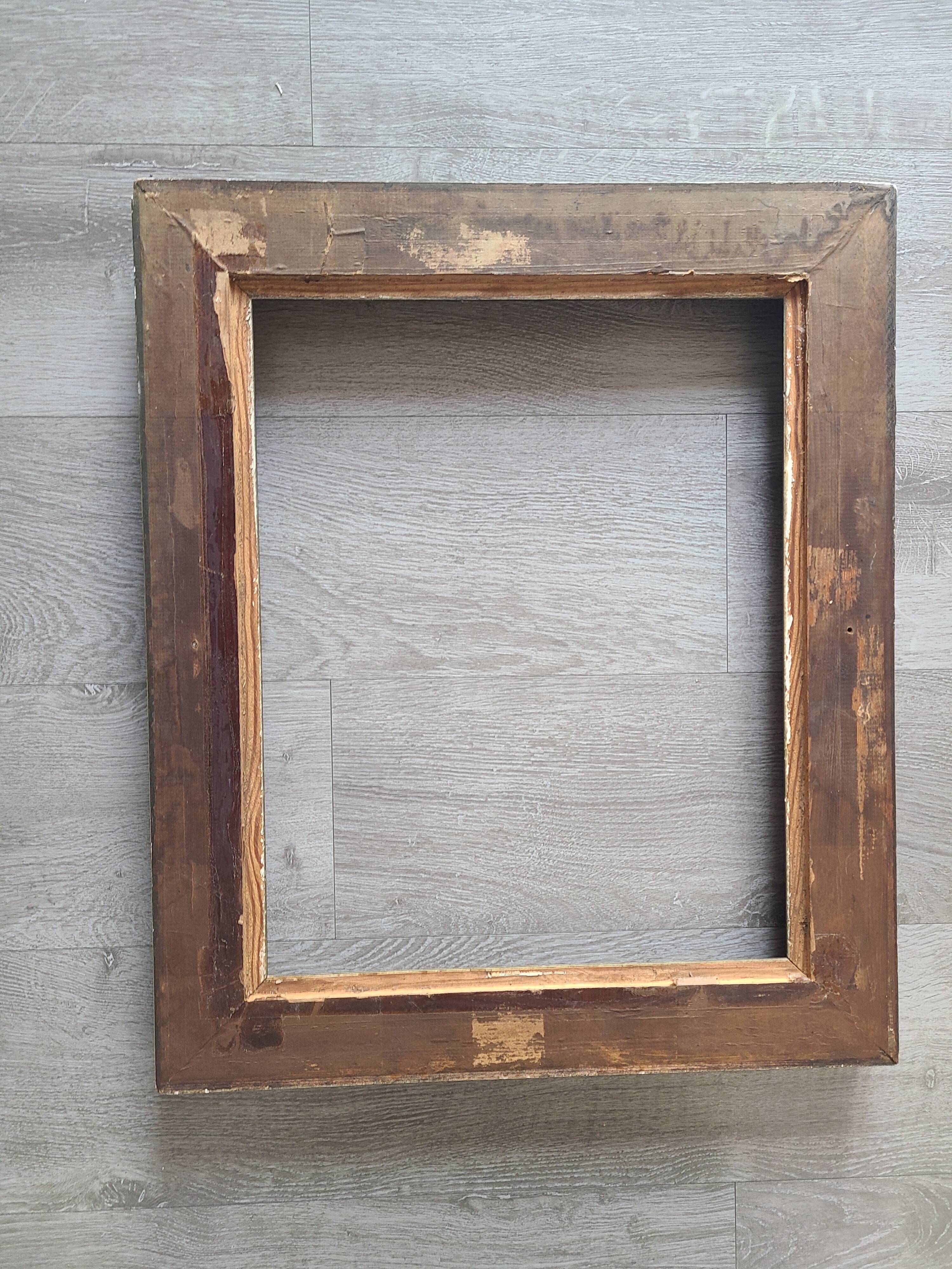 Old 19th century wooden frame with plaster sculpture