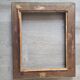 Old 19th century wooden frame with plaster sculpture