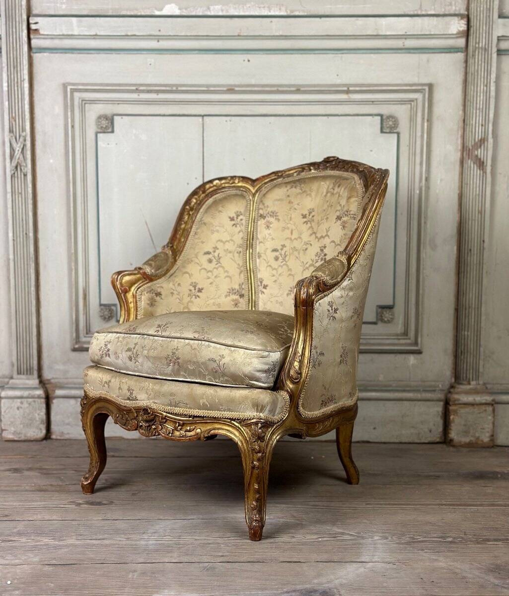 A Louis XV style child's bergère chair in carved and gilded wood, circa 1880