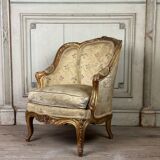 A Louis XV style child's bergère chair in carved and gilded wood, circa 1880