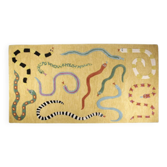 Gros serpents dans le tapis de sable