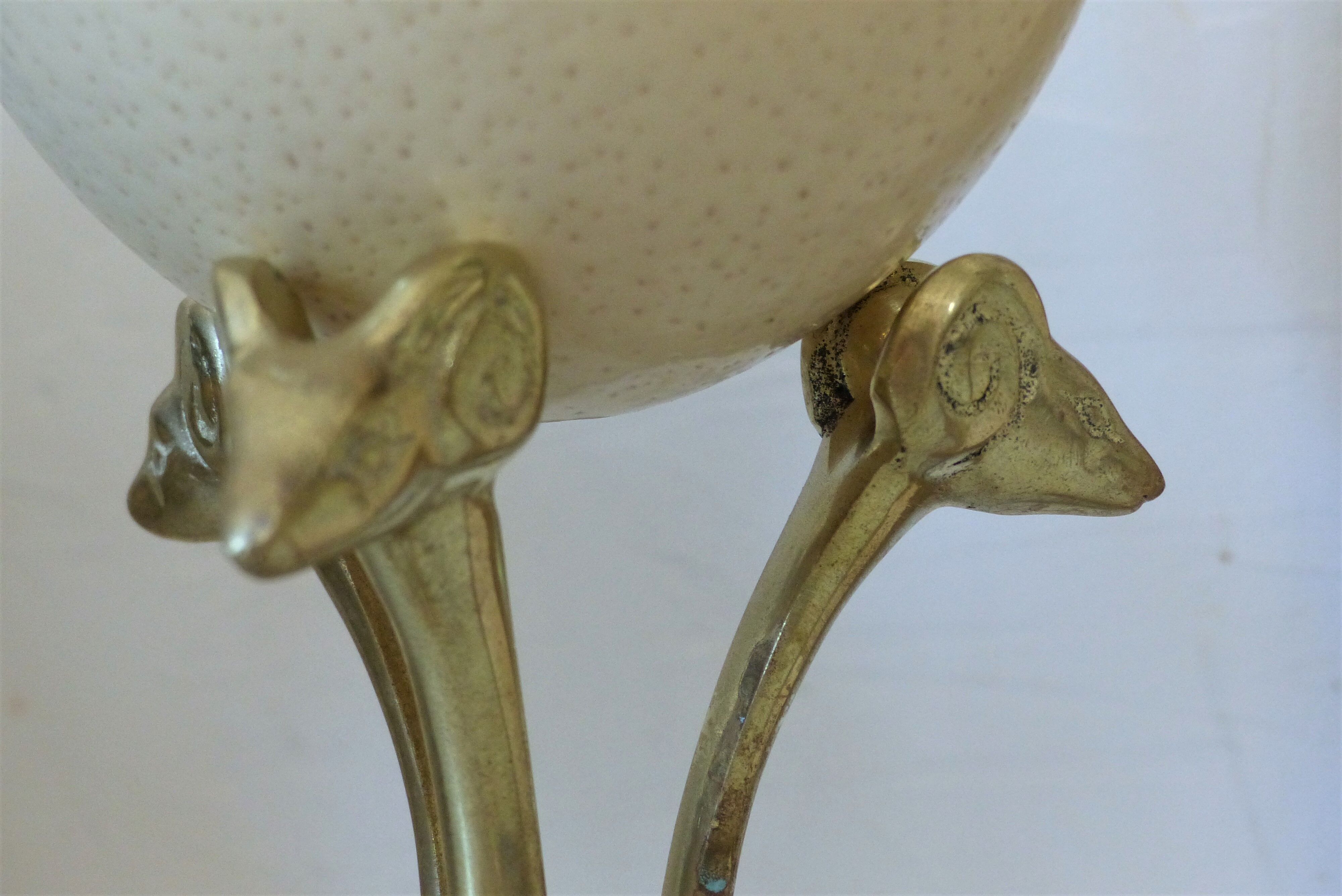 Curiosity object tripod brass and ostrich egg