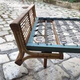Twin rattan beds with built-in bedside tables