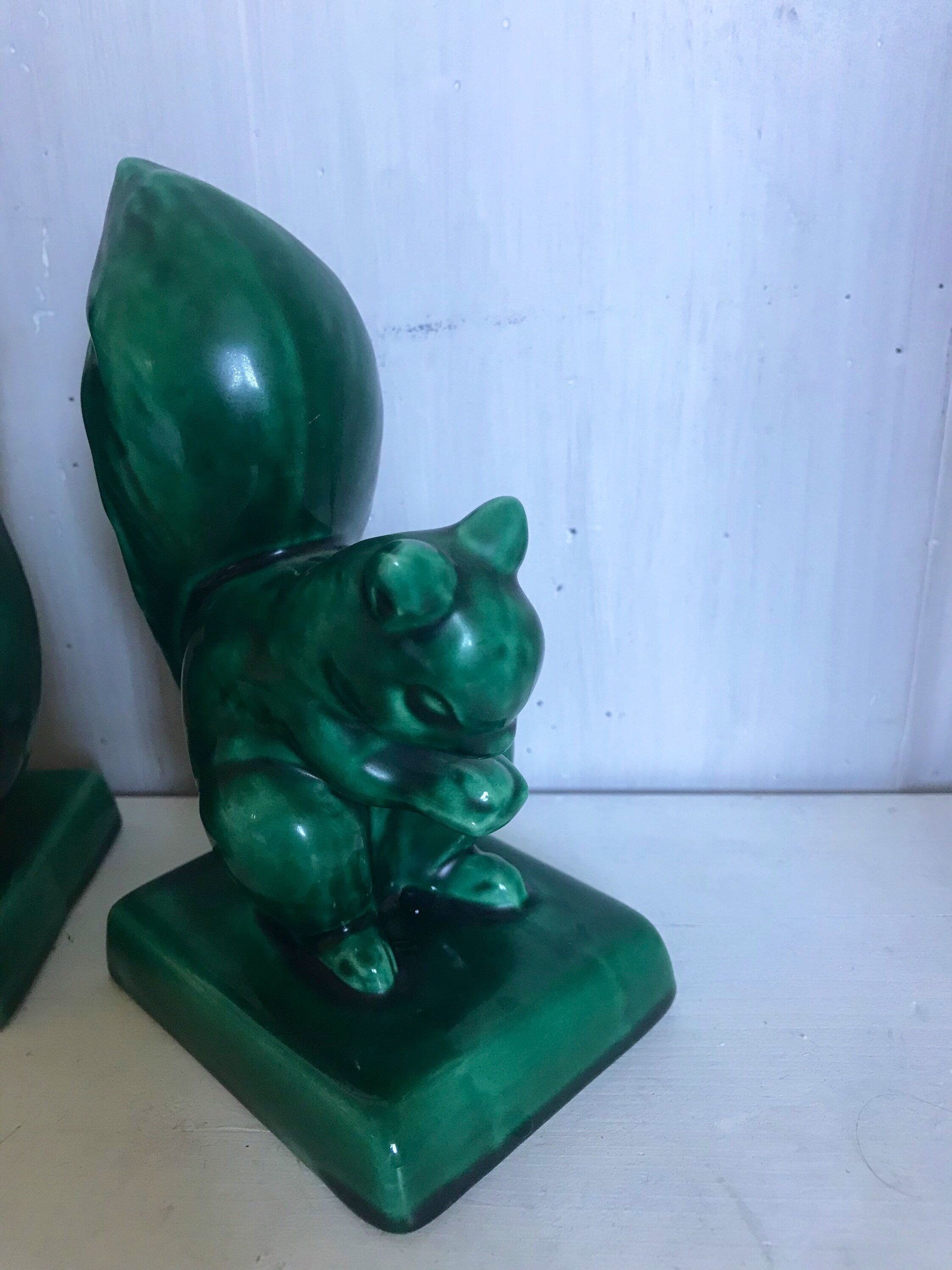 Pair of Art Deco ceramic book clamts