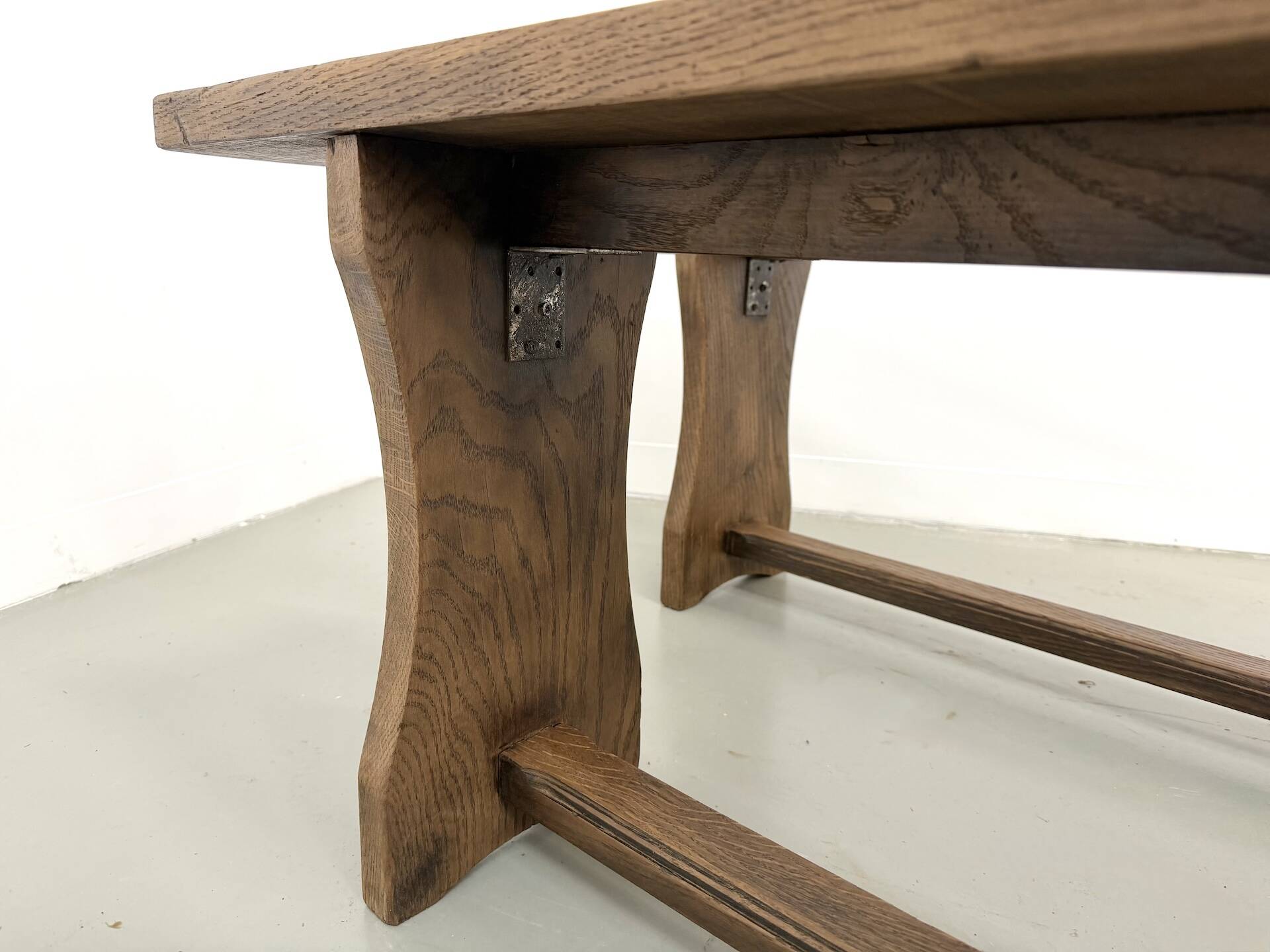 Pair of solid oak benches, winged legs, France, 1970s