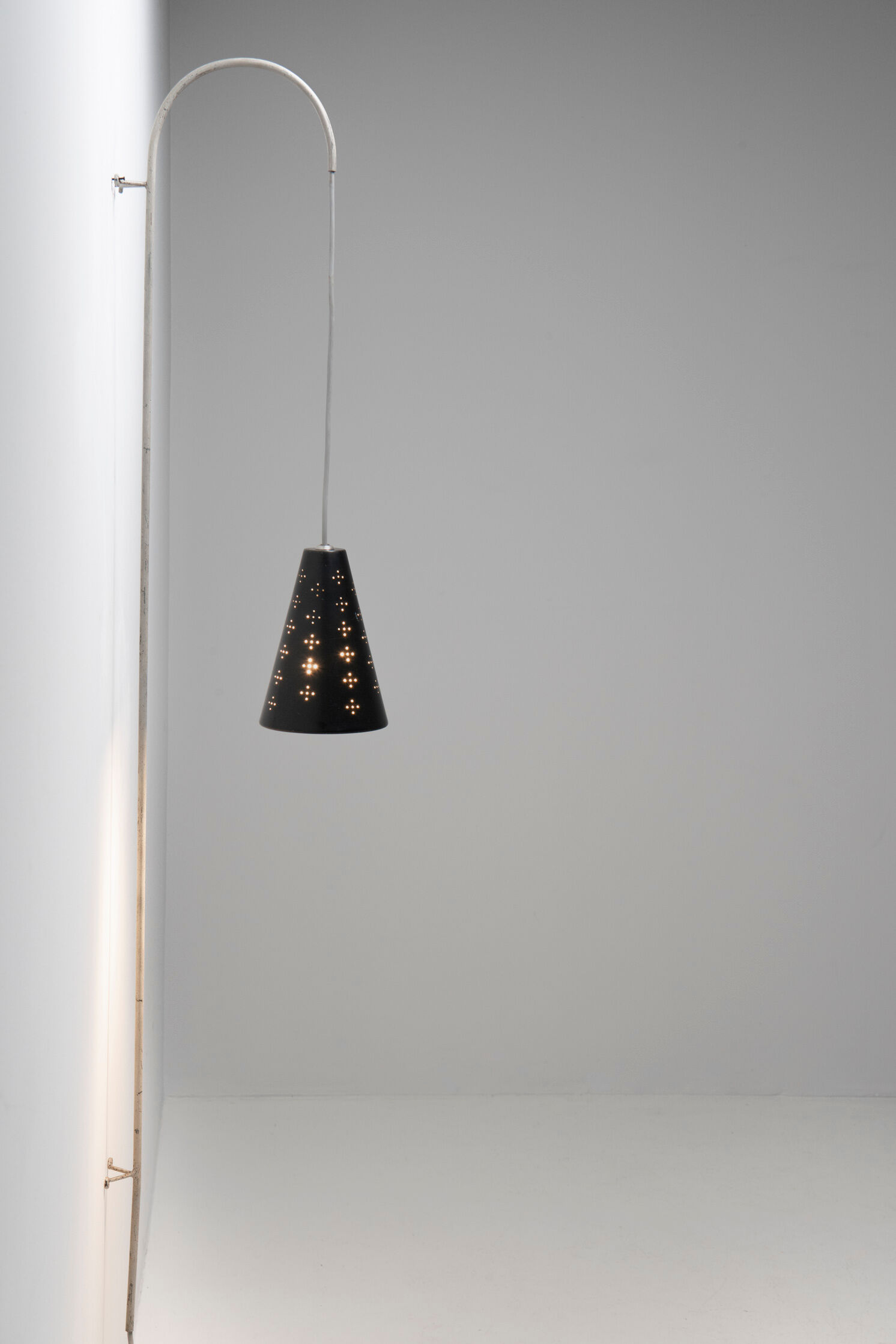 Hanging wall lamp with black perforated cap, 1960's