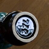 Ancient amphora vase in turquoise glazed stoneware.