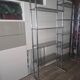 Large vintage double bookshelf from the 70s with chrome and smoked glass.