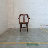 Antique oakwood barber armchair