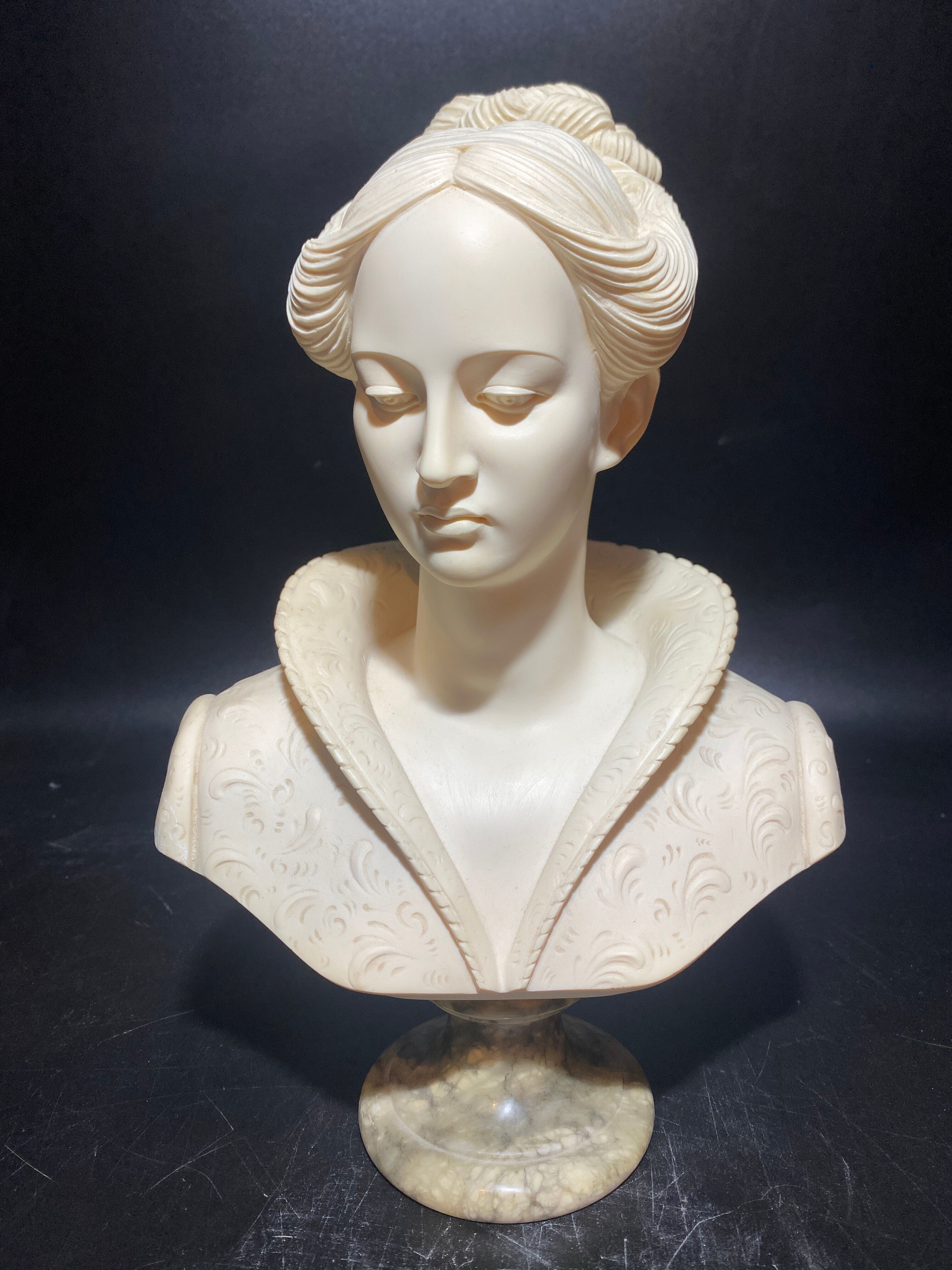 Hand-retouched cast plaster bust