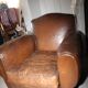Lot de 2 fauteuils club en cuir années 50