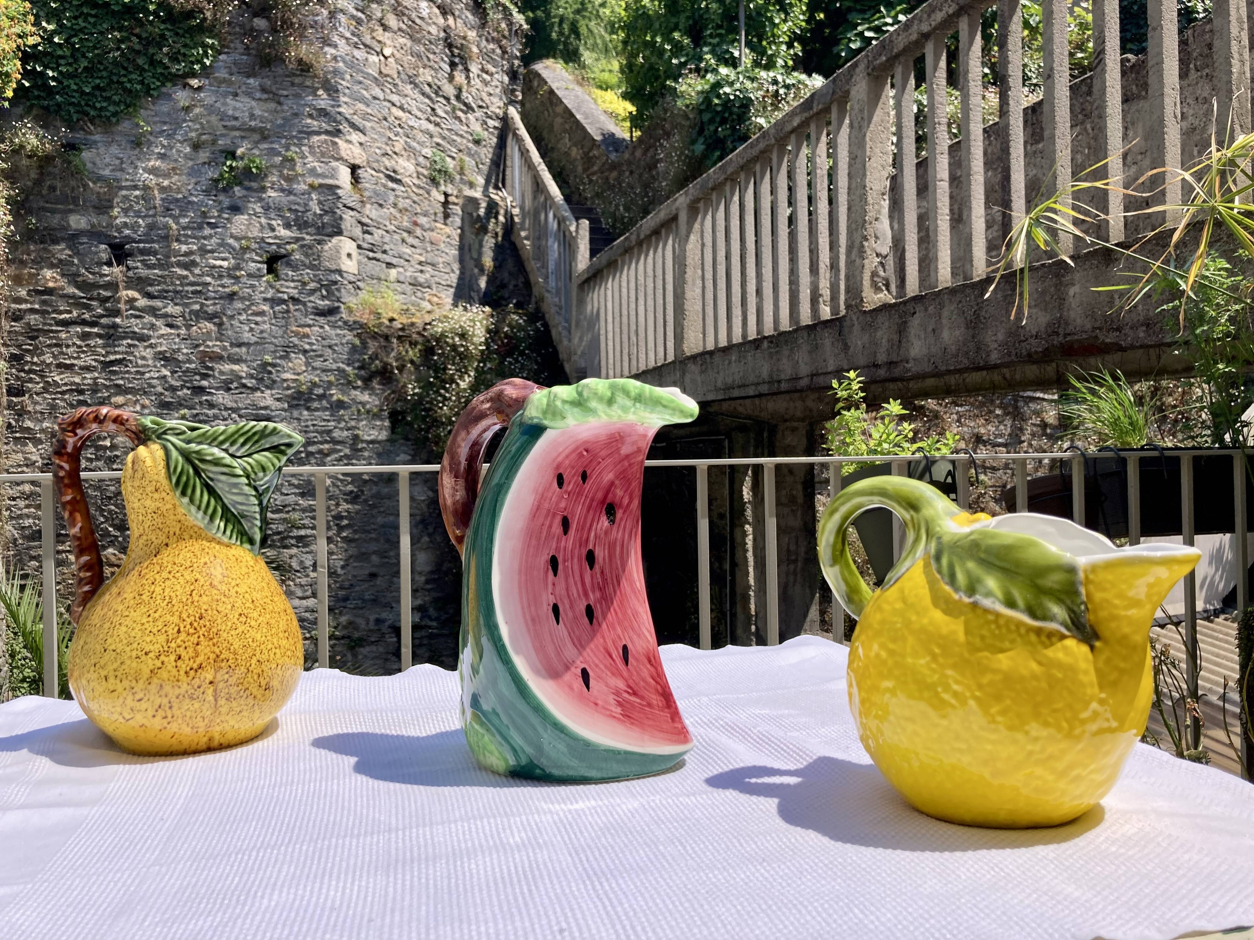 Pitcher in the shape of fruit, pear, slip