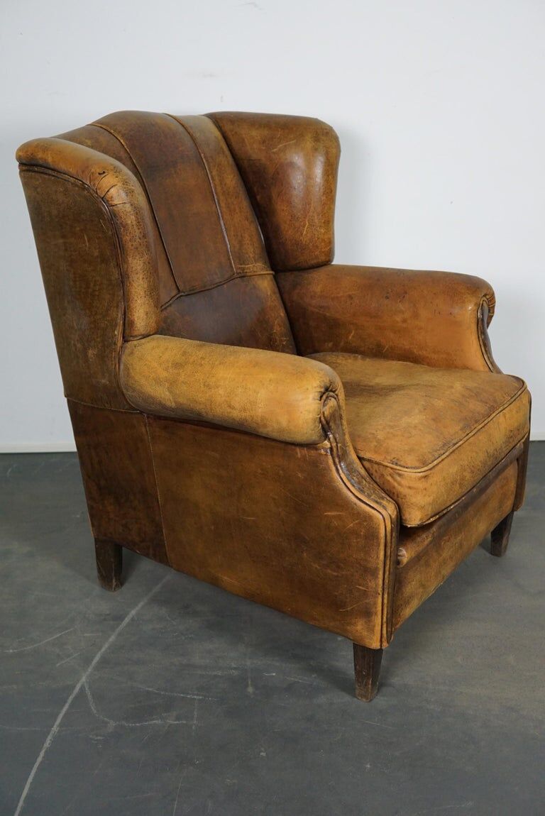 Vintage club chair with leather ears cognac Netherlands