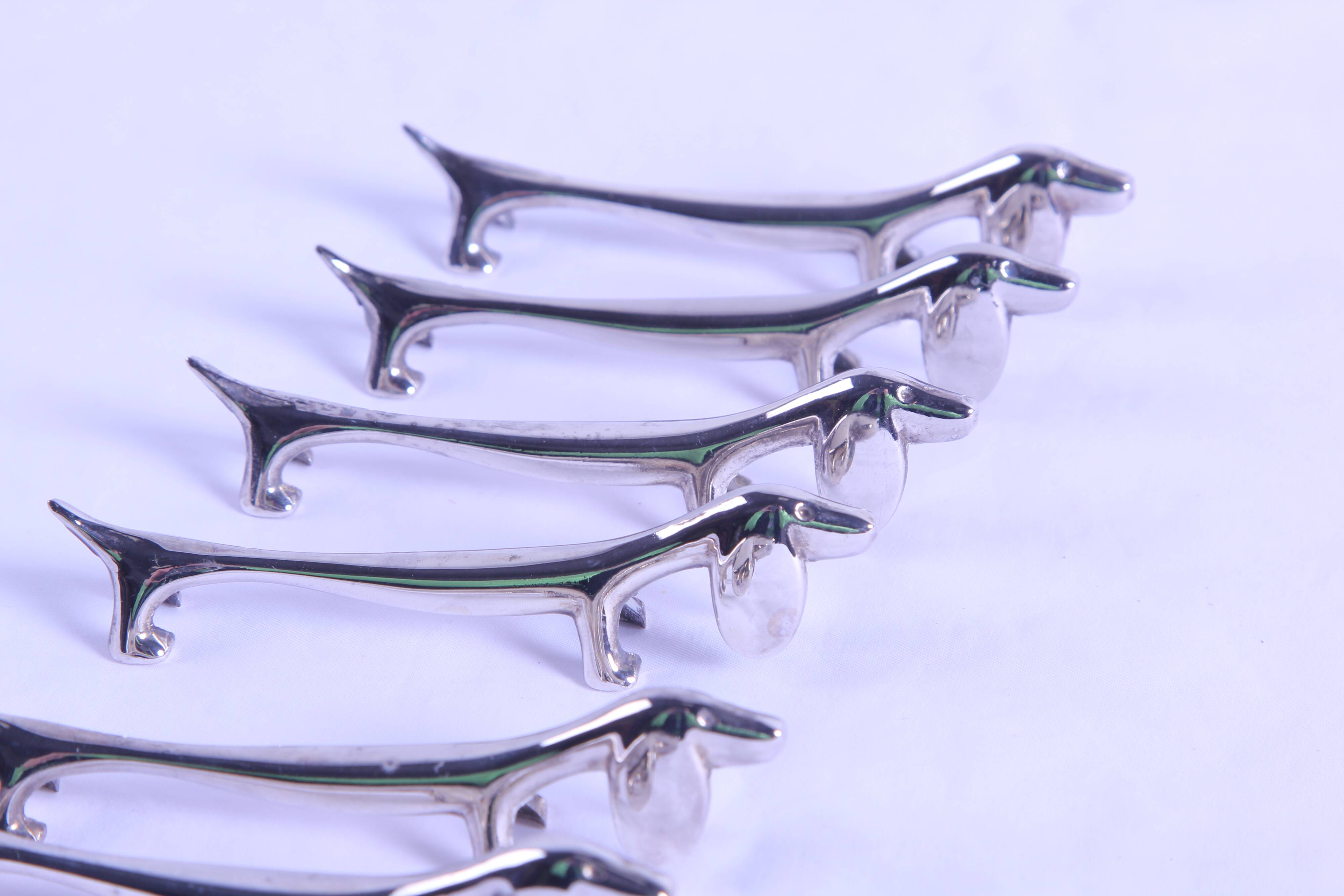 6 vintage metal dog-shaped knife holders
