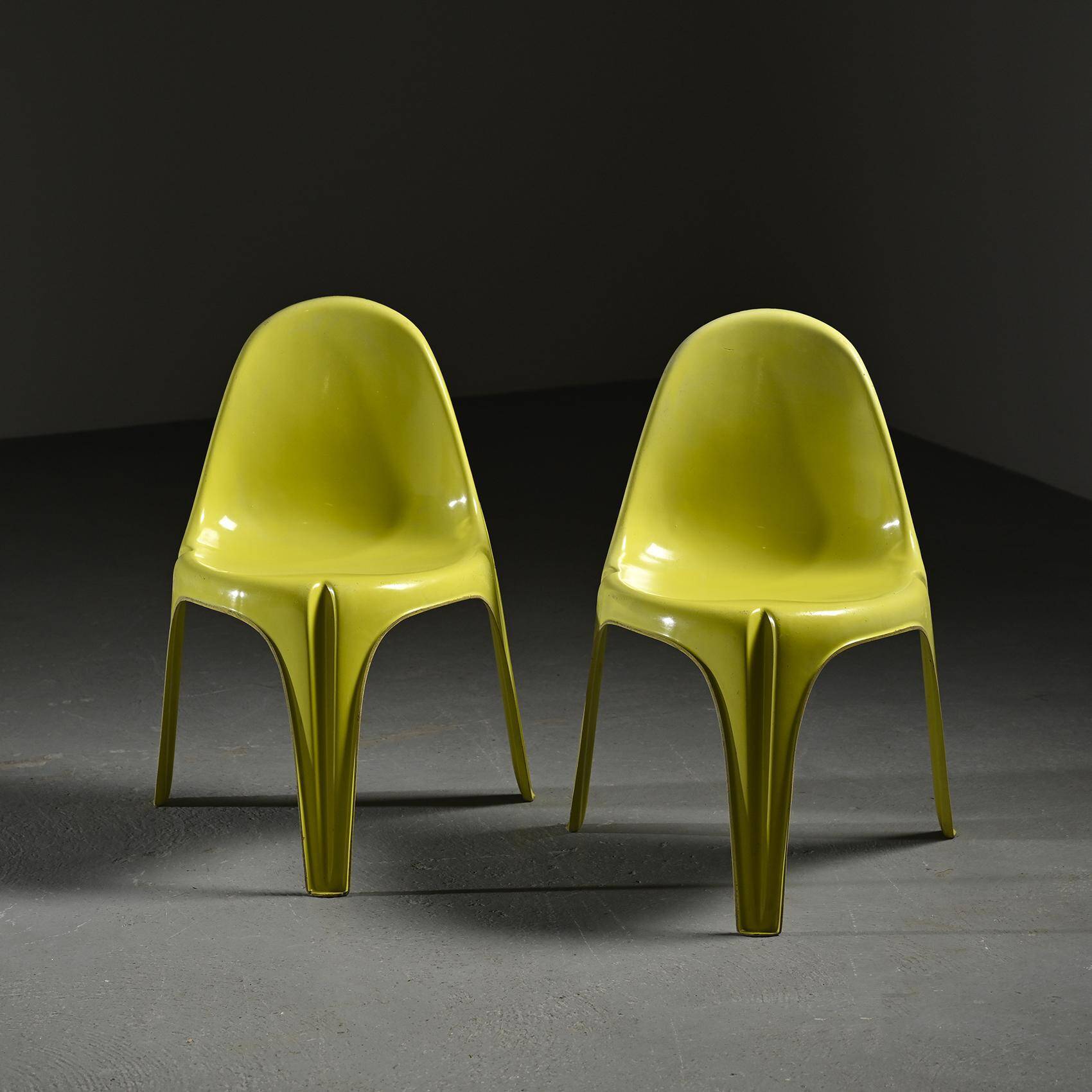 Pair of yellow fiberglass tripod chairs by Walter Frey, circa 1968