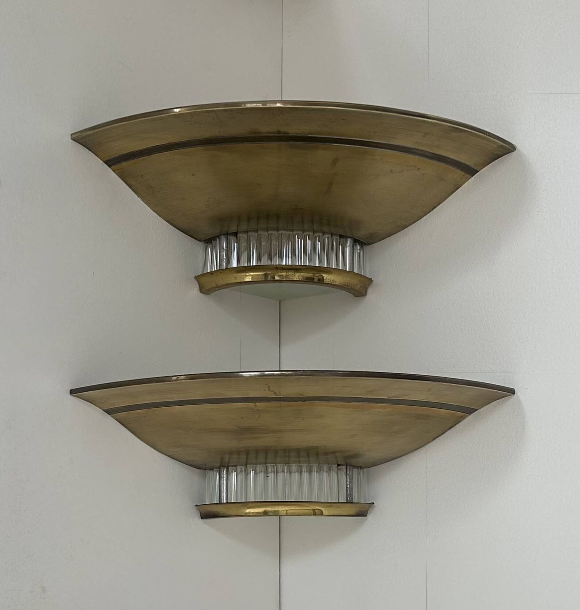 Pair of Art Deco corner sconces, brass and glass, France 1930