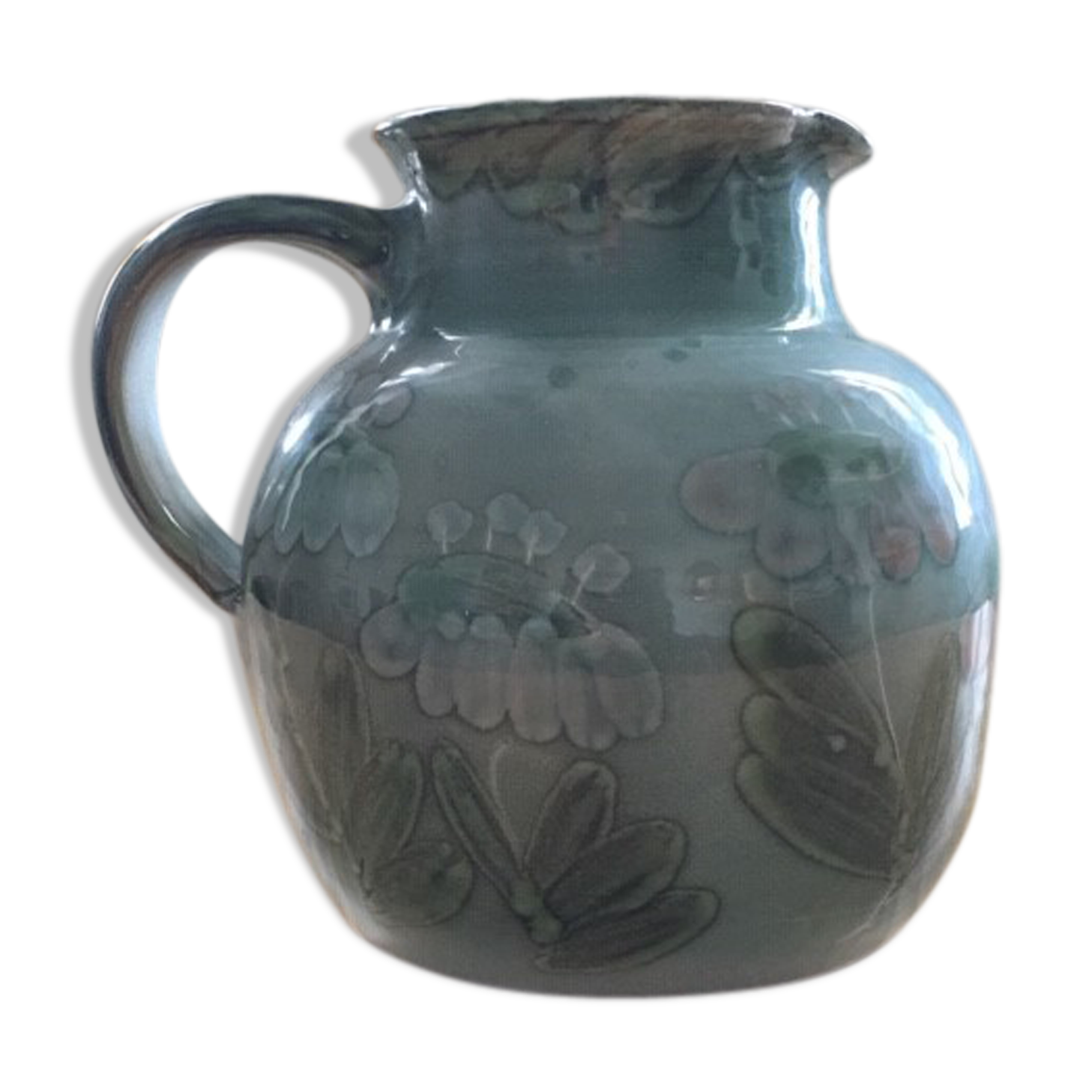 Grey-blue pitcher with floral decoration
