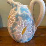 pitcher of daisies