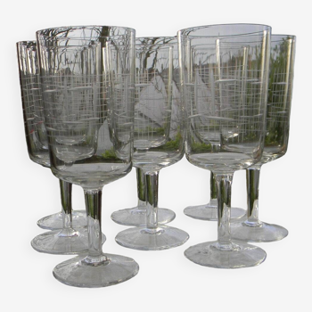 Set of 8 water glasses in 1950s glasses.