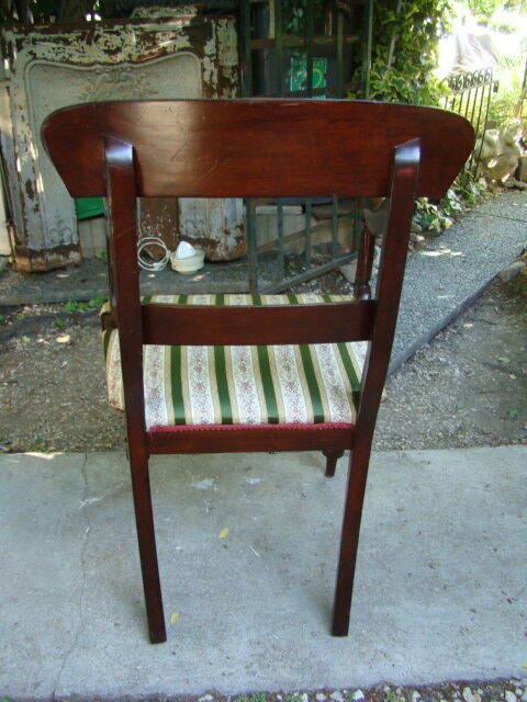 Ancient English mahogany armchair