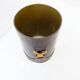 Brown leather wastepaper basket with decorative gold metal buckle.