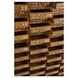 Glass filing cabinet with 125 drawers
