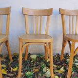 4 chaises de bistrot dont estampillée Baumann