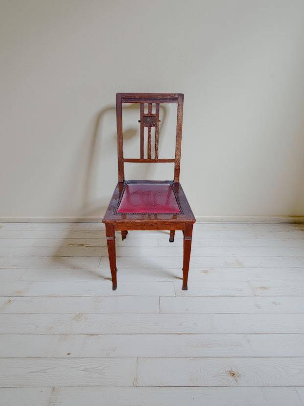 6 Art Deco dining chairs in solid wood and burgundy leather.