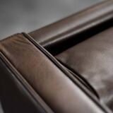 Brown leather wingback chair in mid-century modern Danish style, 1960s.