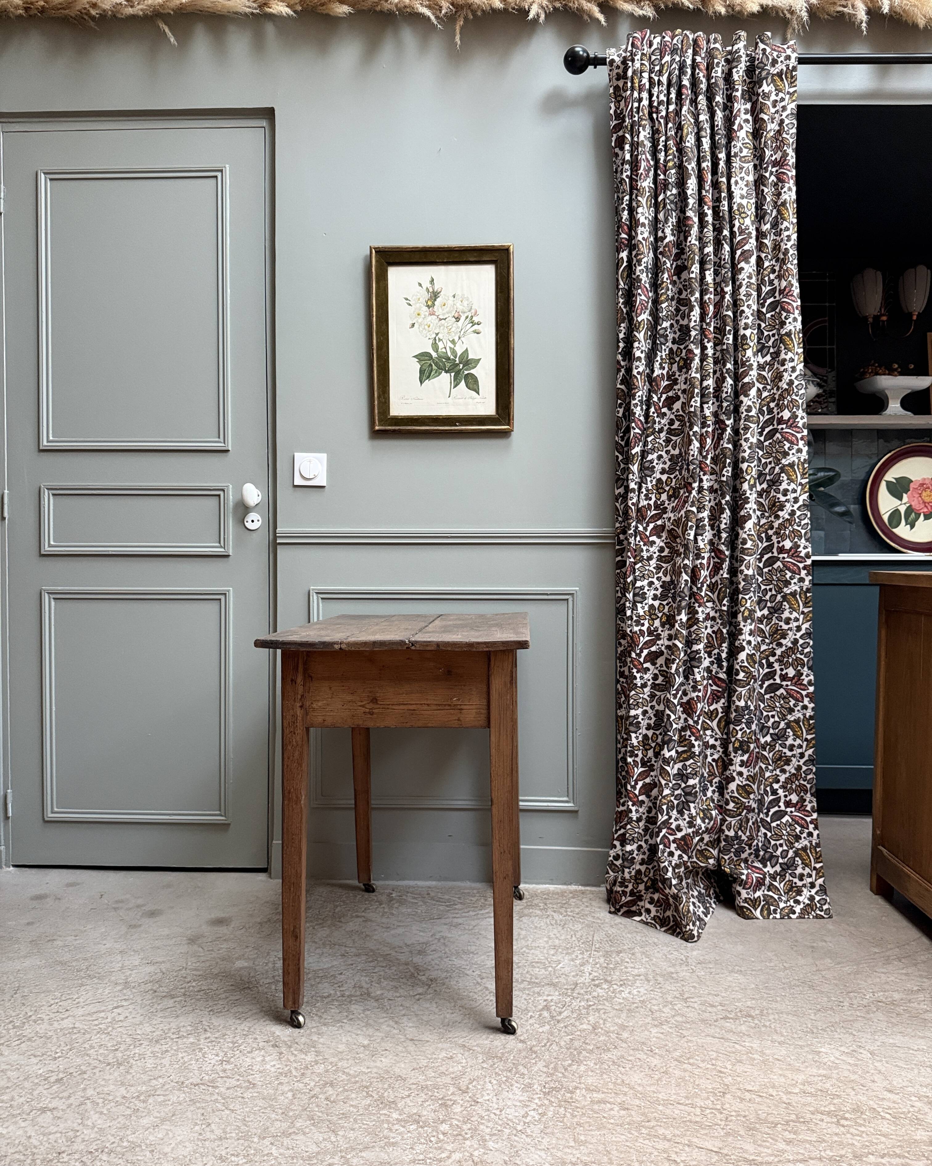 Small antique desk on wheels