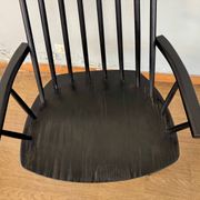 Armchair with armrests and Scandinavian bridge slats